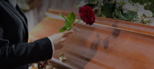 Wrongful Death Lawyer casket with rose